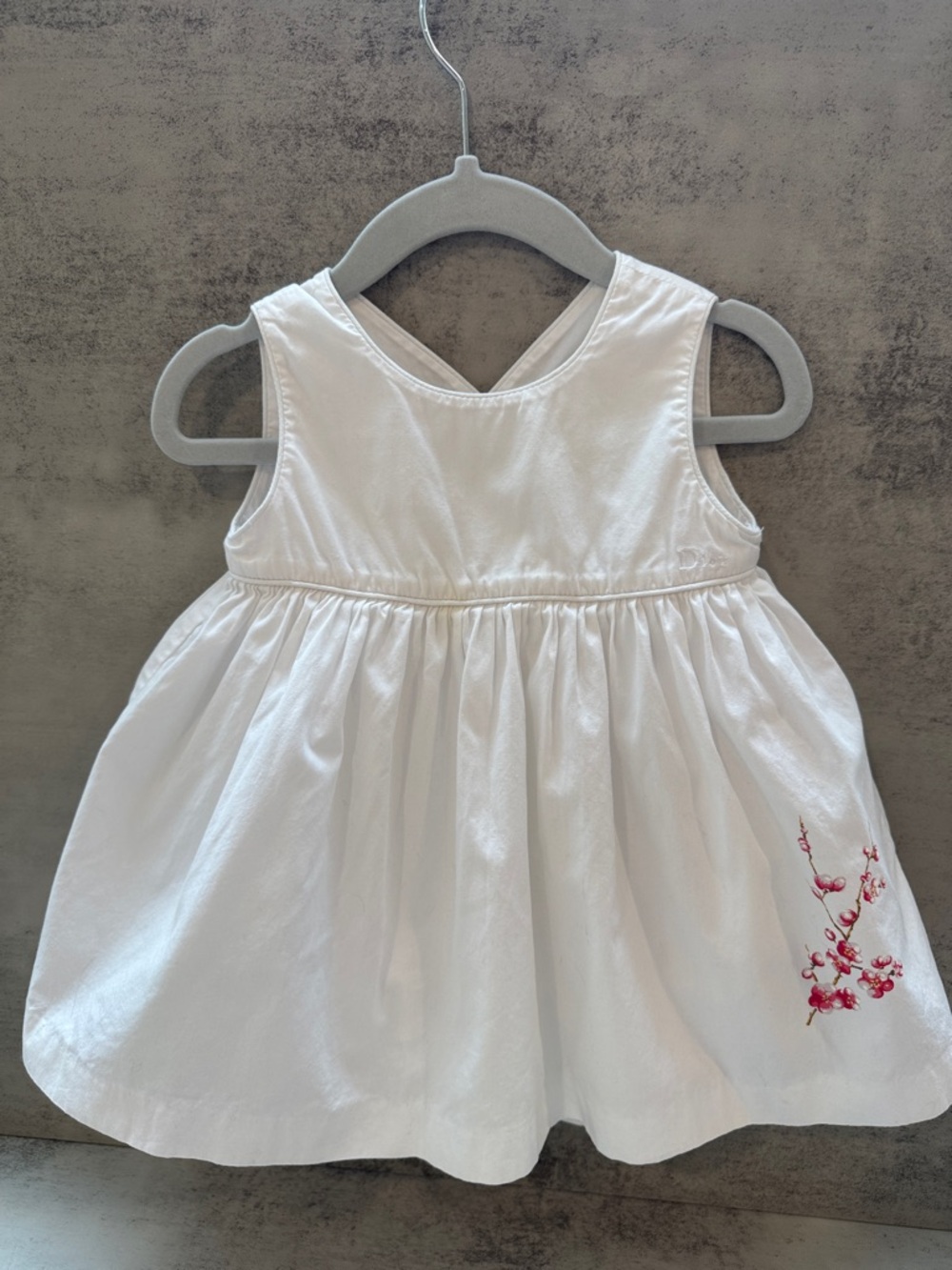 Baby Dior White Cotton Sleeveless Baby Dress with Pink Floral Embroidery